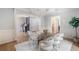 Formal dining room with modern table, stylish chairs, and classic wainscoting at 1720 Buckhead Valley Ne Ln, Atlanta, GA 30324