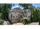 Beautiful brick home with stone accents, attached two-car garage and mature landscaping at 1720 Buckhead Valley Ne Ln, Atlanta, GA 30324