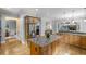 Open kitchen featuring stainless steel refrigerator, granite countertops and hardwood floors at 1720 Buckhead Valley Ne Ln, Atlanta, GA 30324