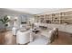 Bright living room features built-in shelving and modern furniture for a comfortable and stylish space at 1720 Buckhead Valley Ne Ln, Atlanta, GA 30324