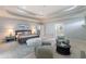 Serene main bedroom with tray ceilings, sitting area, and plush carpeting for ultimate comfort at 1720 Buckhead Valley Ne Ln, Atlanta, GA 30324