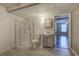 Updated bathroom featuring a glass shower, toilet and vanity with sink and wood-look floors at 20 Spruce Ne St, White, GA 30184