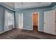 Bedroom featuring an ensuite bathroom and a walk-in closet at 20 Spruce Ne St, White, GA 30184