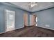 Bedroom featuring an ensuite bathroom and a hallway at 20 Spruce Ne St, White, GA 30184
