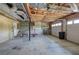 Unfinished garage provides room for storage and projects at 20 Spruce Ne St, White, GA 30184