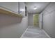 Hallway with bonus storage and access to additional spaces at 20 Spruce Ne St, White, GA 30184