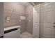 Laundry room with wire shelving and access to the exterior at 20 Spruce Ne St, White, GA 30184