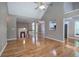 Bright living room boasting hardwood floors, vaulted ceilings, and an open layout to the foyer at 20 Spruce Ne St, White, GA 30184