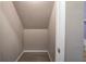 Hall closet with painted walls and wood-look flooring at 20 Spruce Ne St, White, GA 30184