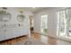 Bright bathroom featuring double vanity, wood floors and light-filled windows at 2729 Ridge Valley Nw Rd, Atlanta, GA 30327