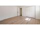 Bedroom featuring wood floors, closet, and ample natural light at 2729 Ridge Valley Nw Rd, Atlanta, GA 30327
