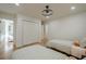 Spacious bedroom featuring two twin beds, hardwood floors, and ample closet space at 2729 Ridge Valley Nw Rd, Atlanta, GA 30327