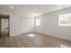 Bedroom featuring wood floors, closet, and plenty of natural light at 2729 Ridge Valley Nw Rd, Atlanta, GA 30327
