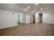 Spacious bonus room featuring wood floors, recessed lighting, and plenty of natural light at 2729 Ridge Valley Nw Rd, Atlanta, GA 30327