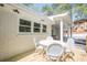 Wooden deck area with outdoor seating table and chairs near the back of the home at 2729 Ridge Valley Nw Rd, Atlanta, GA 30327