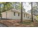 Well-maintained white brick home with neat landscaping, and updated windows that add to its curb appeal at 2729 Ridge Valley Nw Rd, Atlanta, GA 30327