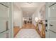 Bright foyer with hardwood floors, a decorative rug, and an entryway table with modern decor at 2729 Ridge Valley Nw Rd, Atlanta, GA 30327