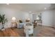 Comfortable living room featuring a gray sofa, modern decor, hardwood floors, and soft lighting at 2729 Ridge Valley Nw Rd, Atlanta, GA 30327