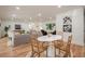 Open floor plan: dining area flows into a living space with stylish furnishings and decor at 2729 Ridge Valley Nw Rd, Atlanta, GA 30327