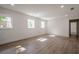 Living room featuring wood floors, recessed lighting, and ample natural light at 2729 Ridge Valley Nw Rd, Atlanta, GA 30327