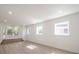 Bright living room featuring wood floors, recessed lighting, and a set of glass French doors at 2729 Ridge Valley Nw Rd, Atlanta, GA 30327