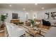 Open living space with a mix of seating, a striped rug, and abundant natural light at 2729 Ridge Valley Nw Rd, Atlanta, GA 30327