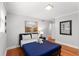 Comfortable bedroom with hardwood floors and neutral decor at 3307 Pointe Bleue Ct, Decatur, GA 30034