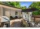 Outdoor deck with dining set and grill, ideal for summer gatherings at 3307 Pointe Bleue Ct, Decatur, GA 30034