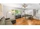 Cozy living room with hardwood floors, natural light, and neutral decor at 3307 Pointe Bleue Ct, Decatur, GA 30034