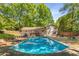 Inviting backyard featuring a sparkling pool, deck, and ample seating for outdoor entertaining at 3307 Pointe Bleue Ct, Decatur, GA 30034