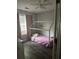 bedroom featuring a stylish bed frame and wood flooring at 5022 Cliff Top Dr, Loganville, GA 30052