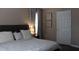 Primary bedroom featuring a modern design with a large bed and ample natural light at 5022 Cliff Top Dr, Loganville, GA 30052
