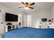 Bedroom view showing a ceiling fan and a TV on the wall at 6790 Wolford Ct, Johns Creek, GA 30097