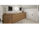 Bedroom with built-in drawers, cabinets, and decor elements at 6790 Wolford Ct, Johns Creek, GA 30097