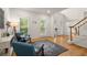 Bright living room with hardwood floors, ample natural light, and neutral decor at 6790 Wolford Ct, Johns Creek, GA 30097