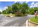 Pleasant neighborhood street view showcases a well-maintained landscape and inviting curb appeal at 6790 Wolford Ct, Johns Creek, GA 30097