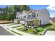 New townhome featuring a landscaped yard, and a welcoming entrance at 12 Jacobs Farm Ln # 6, Lawrenceville, GA 30045