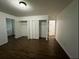 Spacious bedroom features large closets and leads to other living areas at 1247 Shoreham Dr, Atlanta, GA 30349