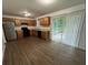 Bright kitchen featuring stainless steel appliances and wood-look flooring at 1247 Shoreham Dr, Atlanta, GA 30349