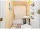Bathroom with a tub and shower combination, sink, and toilet at 1303 Cochise Cir, Austell, GA 30168