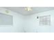 Neutral bedroom with two windows and a ceiling fan at 1303 Cochise Cir, Austell, GA 30168