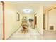 Cozy dining area with tile flooring, a built-in shelf, and adjacent doorway at 1303 Cochise Cir, Austell, GA 30168
