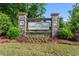 Hawthorne Ridge community sign with manicured landscaping and flowers at 221 Begonia Way, Mcdonough, GA 30253