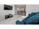 Upstairs loft area with a comfortable couch, a TV, and access to other rooms in the house at 221 Begonia Way, Mcdonough, GA 30253