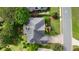 Aerial view of a well-maintained home with a beautiful lawn and driveway at 3143 Denton Ne Pl, Roswell, GA 30075