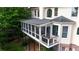 An aerial view of the screened porch with a balcony, great for entertaining at 3143 Denton Ne Pl, Roswell, GA 30075