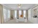 This office features bright windows and built-in shelving at 3143 Denton Ne Pl, Roswell, GA 30075