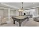 Spacious game room with a pool table, and playroom area at 3143 Denton Ne Pl, Roswell, GA 30075