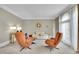 Cozy sitting room with stylish furnishings, neutral walls, and large windows at 3143 Denton Ne Pl, Roswell, GA 30075