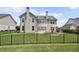 Beautifully landscaped backyard with patio, fire pit and space for outdoor entertainment at 320 Harvest View Ter, Woodstock, GA 30188